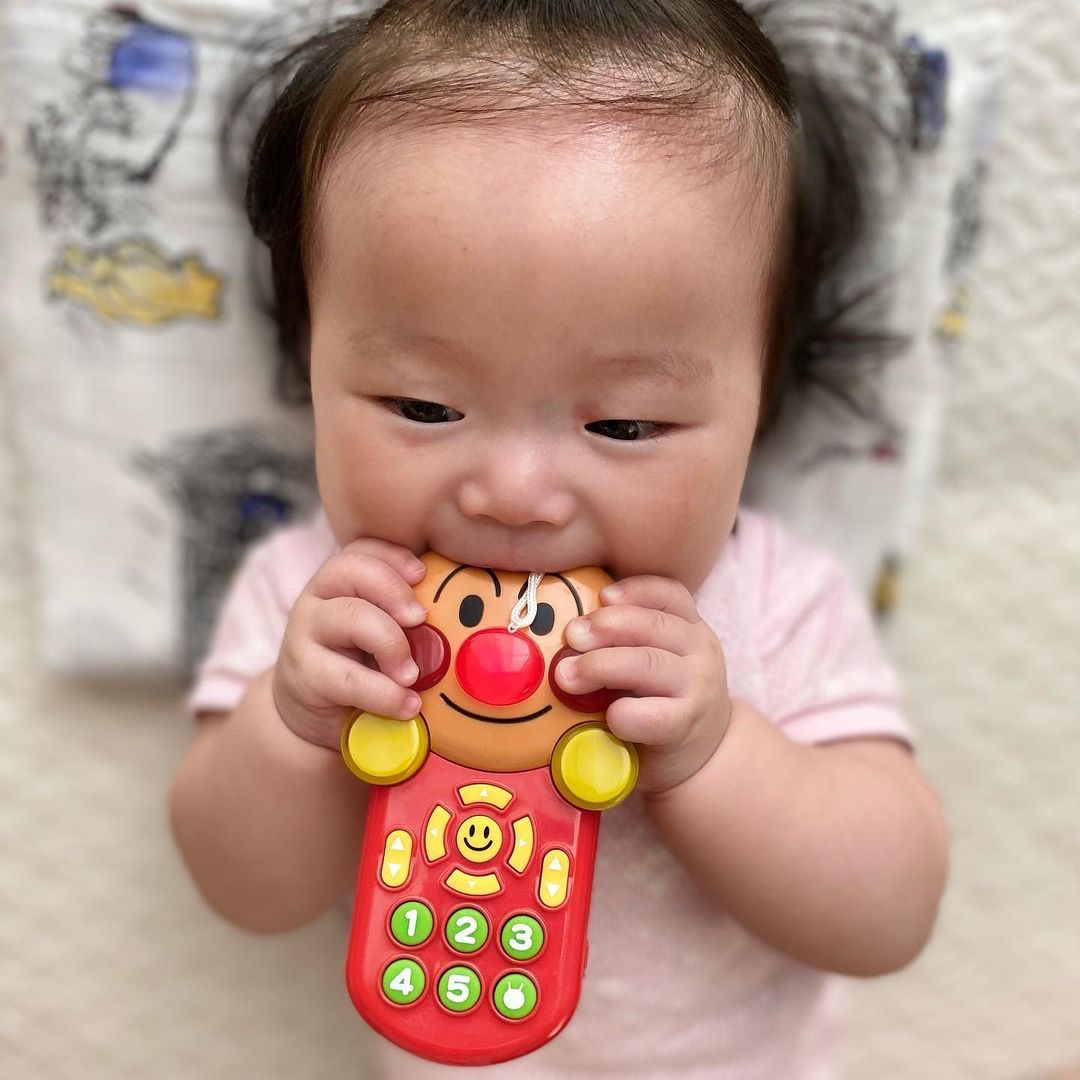 日本 面包超人婴儿电话遥控器带挂钩有22种声音仿真音乐手机玩具