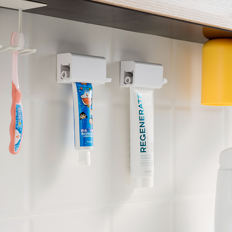 磁吸式挤牙膏器挤小样洗面奶夹子壁挂牙刷置物架儿童手动挤压神器