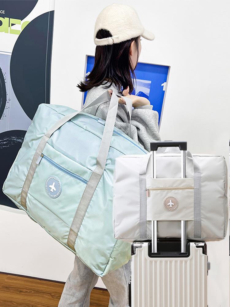 大容量手提短途登机旅行包女士可折叠学生拉杆行李包待产包收纳袋