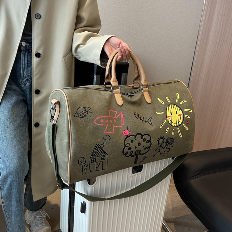 帆布短途旅行包大容量女涂鸦手提行李袋便携运动健身包男登机包潮