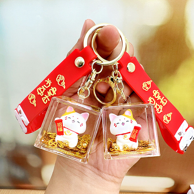 入油桌面摆件金色流沙招财猫创意亚克力钥匙扣包包挂件儿童小礼物