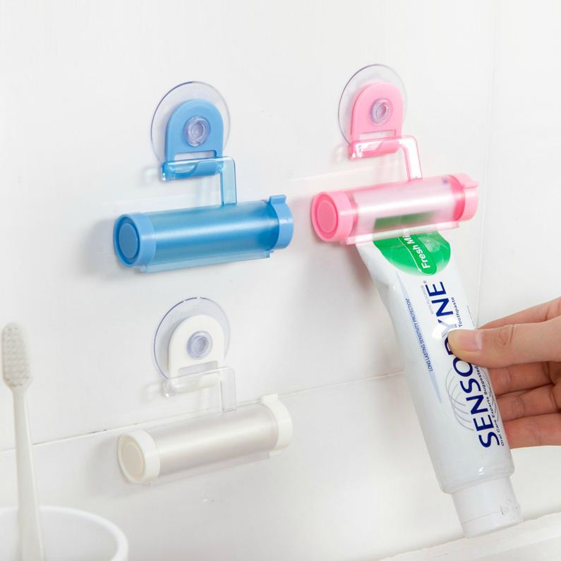 创意吸盘可挂式挤牙膏器牙膏挂架 多功能洗面奶牙膏手动挤压器
